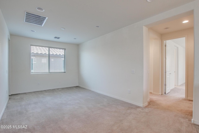 13391 N Flaxleaf Pl, Oro Valley, AZ 85755 - unfurnished room featuring light colored carpet, recessed lighting, and baseboards