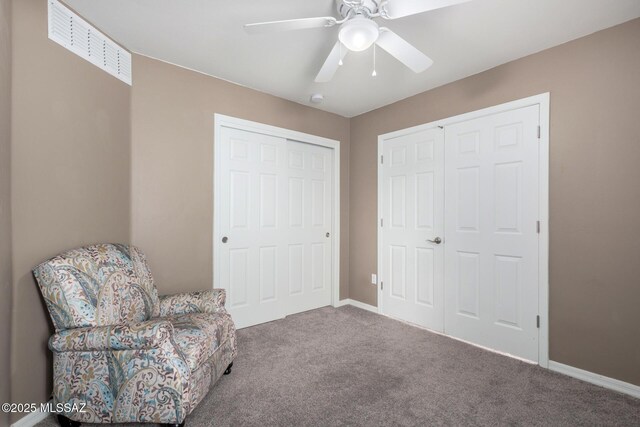 4112 E Shadow Branch Dr, Tucson, AZ 85756 - living area with carpet floors, a ceiling fan, and baseboards
