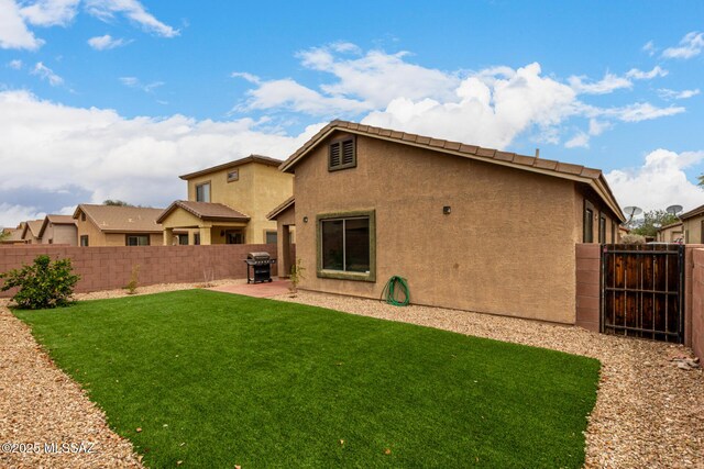 4112 E Shadow Branch Dr, Tucson, AZ 85756 - rear view of property with stucco siding, a patio, and a gate