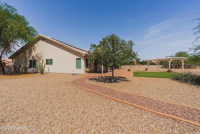 6805 W Tombstone Way, Tucson, AZ 85743 - fenced backyard featuring a pergola and a patio