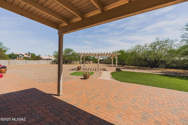 6805 W Tombstone Way, Tucson, AZ 85743 - fenced backyard with a patio and a pergola