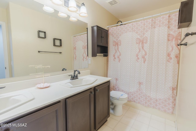 6805 W Tombstone Way, Tucson, AZ 85743 - full bath with double vanity, toilet, and a shower with shower curtain