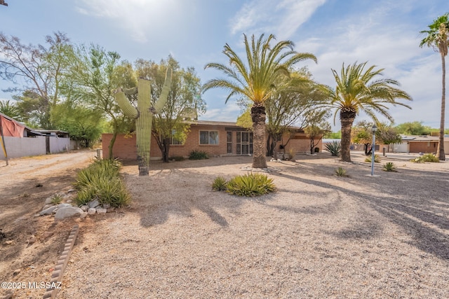2501 W Calle Paraiso, Tucson, AZ 85745 - view of front of home featuring brick siding