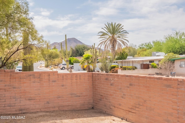 2501 W Calle Paraiso, Tucson, AZ 85745 - view of yard with a mountain view