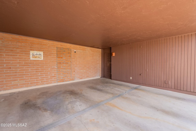 2501 W Calle Paraiso, Tucson, AZ 85745 - spare room with unfinished concrete flooring