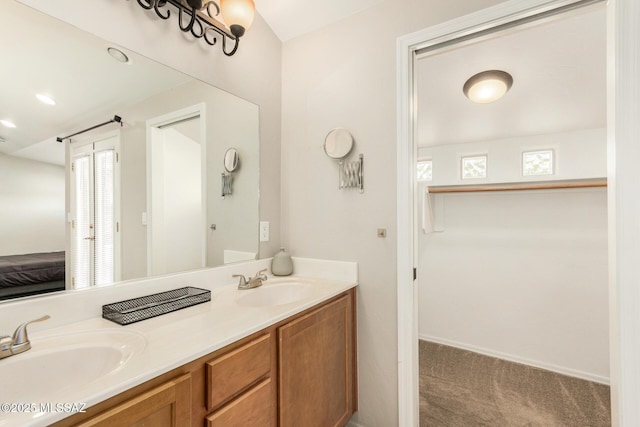 318 N Hasman Dr, Tucson, AZ 85745 - bathroom with double vanity and ensuite bathroom