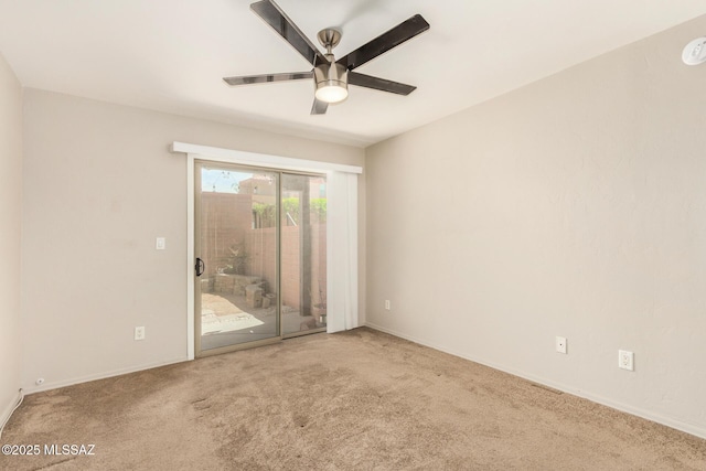318 N Hasman Dr, Tucson, AZ 85745 - spare room featuring carpet flooring, a ceiling fan, and baseboards