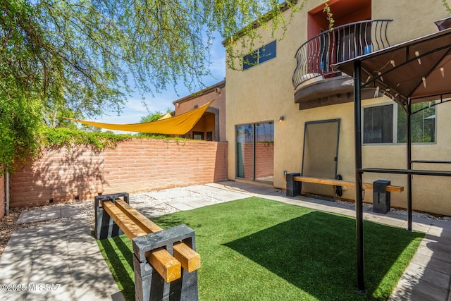 318 N Hasman Dr, Tucson, AZ 85745 - view of yard with a balcony and a patio area
