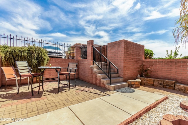 318 N Hasman Dr, Tucson, AZ 85745 - fenced backyard with a patio and outdoor dining space