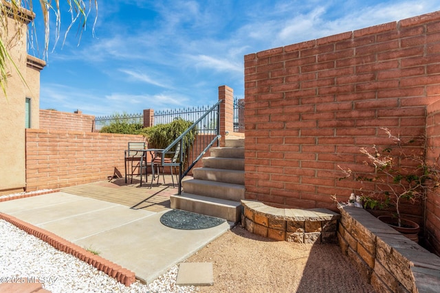 318 N Hasman Dr, Tucson, AZ 85745 - fenced backyard featuring a patio
