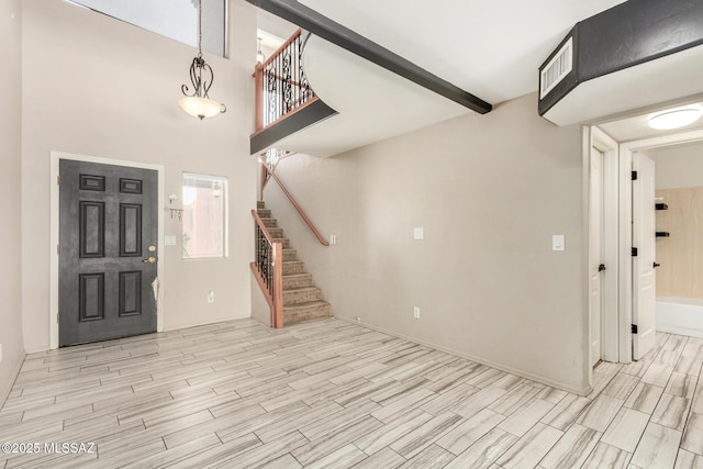 318 N Hasman Dr, Tucson, AZ 85745 - entrance foyer with stairs and wood finish floors