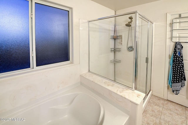 4795 E Silverpuffs Way, Tucson, AZ 85756 - full bath featuring a stall shower, a garden tub, and tile patterned flooring