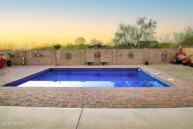 4795 E Silverpuffs Way, Tucson, AZ 85756 - view of swimming pool featuring a fenced backyard and a patio