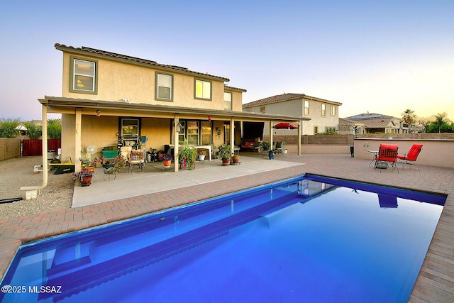 4795 E Silverpuffs Way, Tucson, AZ 85756 - back of property featuring a patio, a fenced backyard, and stucco siding