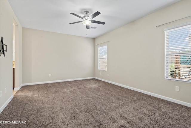 12223 E Becker Dr, Vail, AZ 85641 - spare room featuring a ceiling fan, carpet, and baseboards