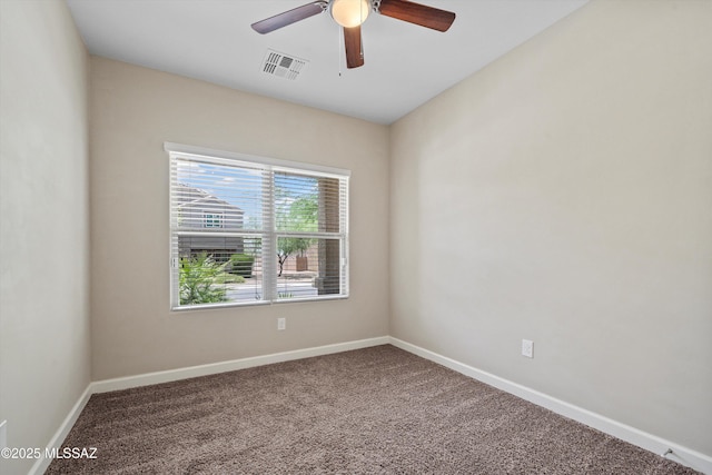 12223 E Becker Dr, Vail, AZ 85641 - unfurnished room featuring carpet flooring, a ceiling fan, and baseboards