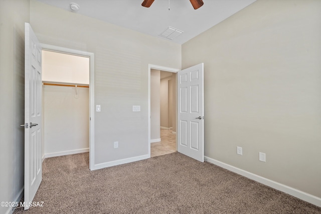 12223 E Becker Dr, Vail, AZ 85641 - unfurnished bedroom featuring carpet, baseboards, a spacious closet, and a closet