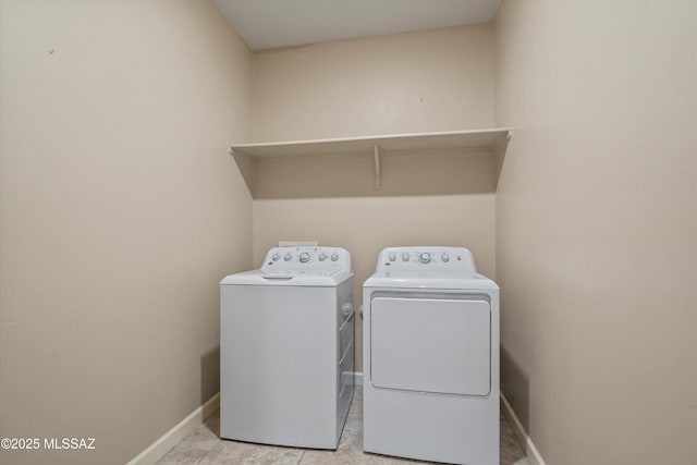 12223 E Becker Dr, Vail, AZ 85641 - laundry area featuring separate washer and dryer and baseboards