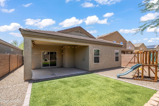 12223 E Becker Dr, Vail, AZ 85641 - back of house featuring stucco siding, a patio area, and a playground