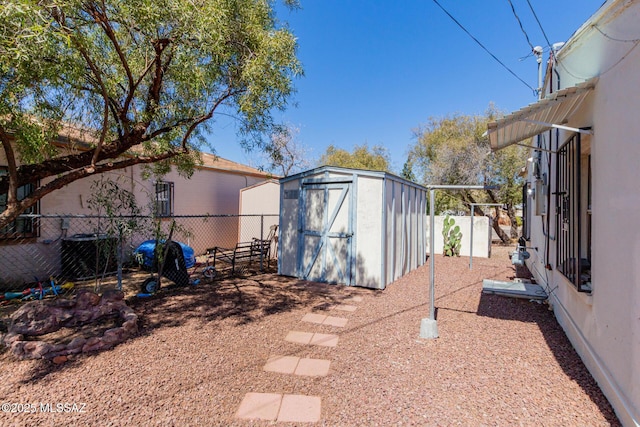 1026 E Mitchell St, Tucson, AZ 85719 - fenced backyard featuring central air condition unit