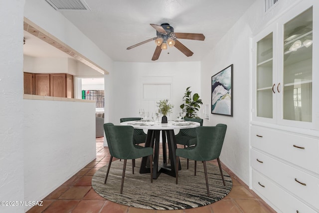 1026 E Mitchell St, Tucson, AZ 85719 - dining area featuring tile patterned flooring and a ceiling fan