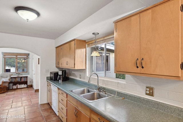365 E Parkside St, Oracle, AZ 85623 - kitchen featuring a sink, black microwave, white dishwasher, arched walkways, and pendant lighting