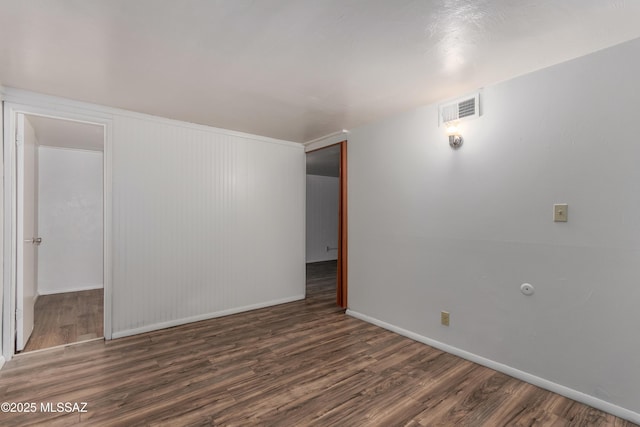 1238 S Camino Seco, Tucson, AZ 85710 - empty room with wood finished floors and baseboards