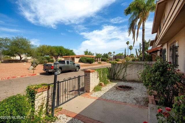 1238 S Camino Seco, Tucson, AZ 85710 - view of yard featuring a gate