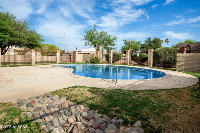 1238 S Camino Seco, Tucson, AZ 85710 - view of pool with a fenced backyard and a patio