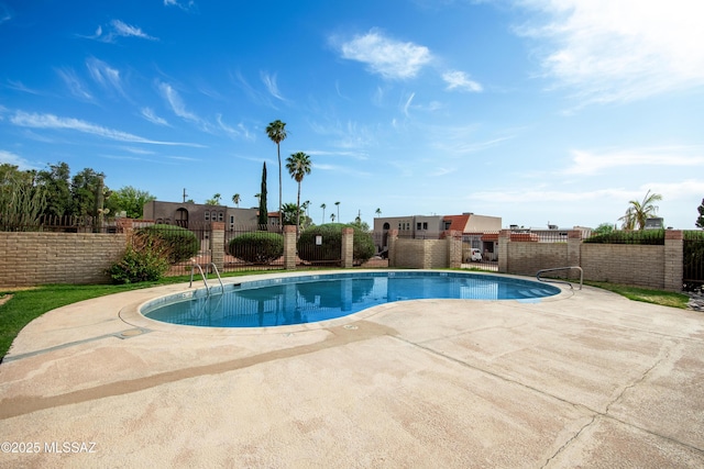 1238 S Camino Seco, Tucson, AZ 85710 - view of swimming pool featuring a patio area