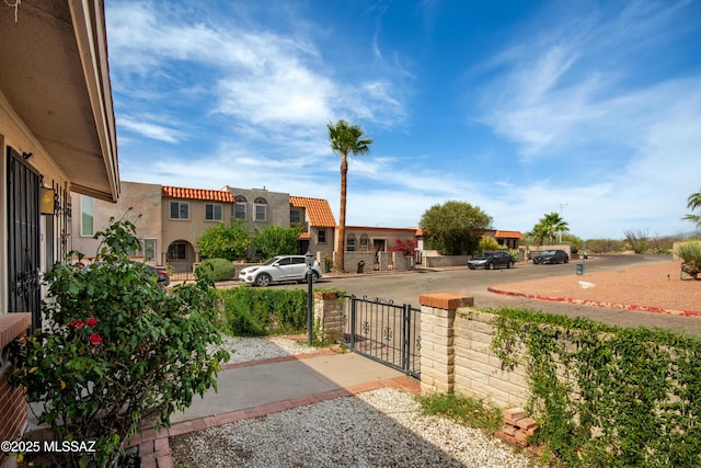 1238 S Camino Seco, Tucson, AZ 85710 - view of yard featuring a gate