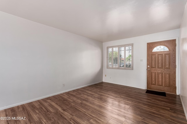 1238 S Camino Seco, Tucson, AZ 85710 - entryway with dark wood-style floors and baseboards
