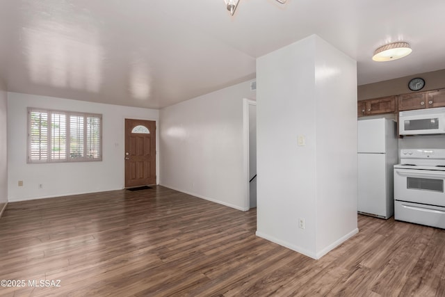 1238 S Camino Seco, Tucson, AZ 85710 - entryway with wood finished floors and baseboards