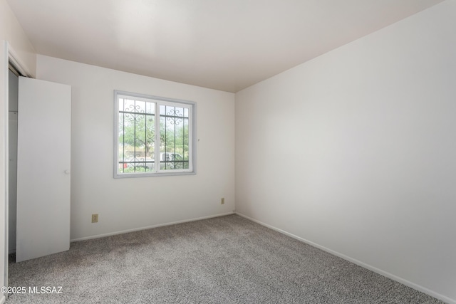 1238 S Camino Seco, Tucson, AZ 85710 - empty room featuring carpet and baseboards