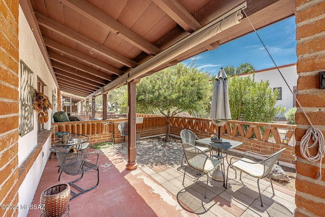 303 S Paseo Cerro Unit A, Green Valley, AZ 85614 - wooden deck featuring a patio area and outdoor dining space