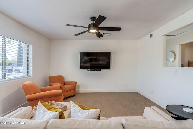 5762 E Helen St, Tucson, AZ 85712 - carpeted living room featuring ceiling fan and baseboards