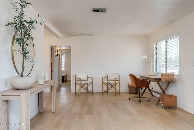 5762 E Helen St, Tucson, AZ 85712 - office area featuring light wood-type flooring and baseboards