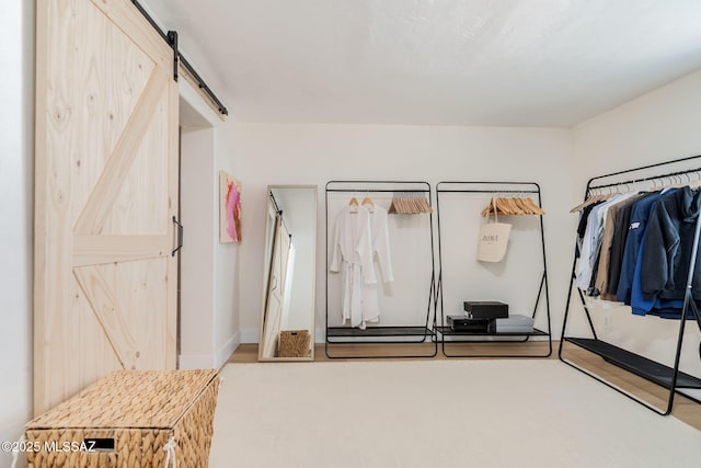 5762 E Helen St, Tucson, AZ 85712 - bedroom featuring a barn door