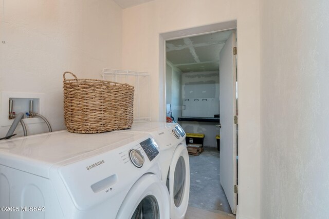 5762 E Helen St, Tucson, AZ 85712 - washroom with washer and clothes dryer