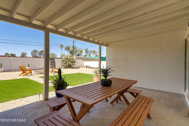5762 E Helen St, Tucson, AZ 85712 - view of patio featuring outdoor dining area and a fire pit