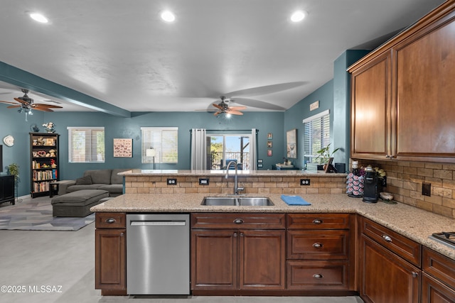 17213 S Mesa Shadows Dr, Vail, AZ 85641 - kitchen with stainless steel dishwasher, a sink, ceiling fan, open floor plan, and recessed lighting