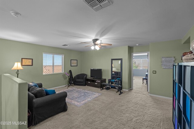 17213 S Mesa Shadows Dr, Vail, AZ 85641 - carpeted living room featuring ceiling fan and baseboards