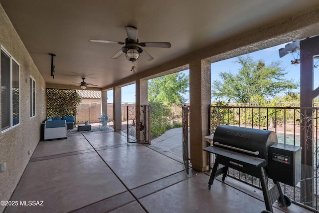 17213 S Mesa Shadows Dr, Vail, AZ 85641 - fenced backyard with a grill, a ceiling fan, and a patio area