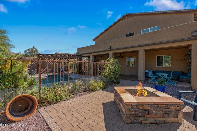17213 S Mesa Shadows Dr, Vail, AZ 85641 - fenced backyard with a patio area and an outdoor living space with a fire pit
