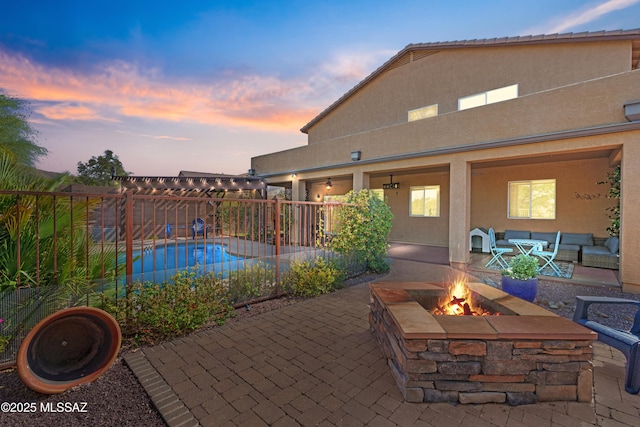 17213 S Mesa Shadows Dr, Vail, AZ 85641 - view of swimming pool with a fire pit, a patio, and a fenced backyard
