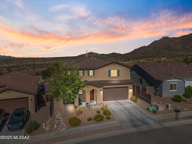 17213 S Mesa Shadows Dr, Vail, AZ 85641 - traditional-style house featuring concrete driveway, stucco siding, a mountain view, and a tile roof