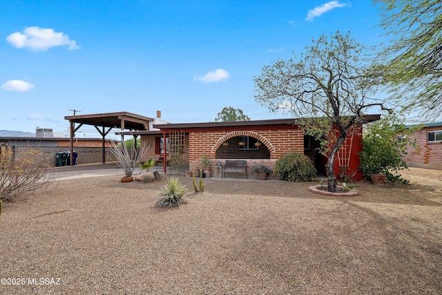 1709 S Avenida Sirio, Tucson, AZ 85710 - view of front of house featuring brick siding
