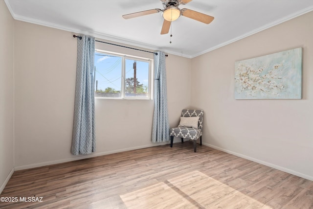 1709 S Avenida Sirio, Tucson, AZ 85710 - unfurnished room with ornamental molding, wood finished floors, baseboards, and a ceiling fan