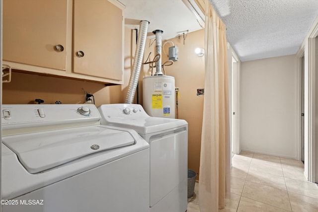 1709 S Avenida Sirio, Tucson, AZ 85710 - laundry area with water heater, washing machine and clothes dryer, cabinet space, and light tile patterned floors