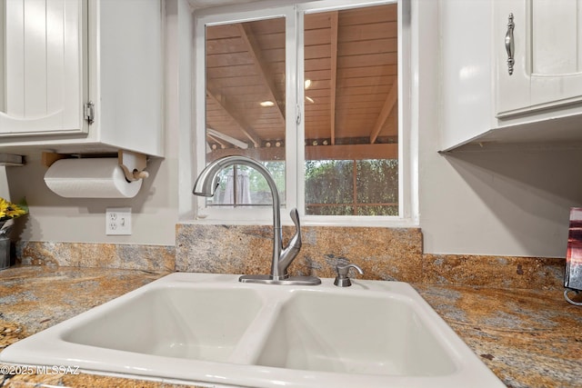 1709 S Avenida Sirio, Tucson, AZ 85710 - kitchen view of a sink and white cabinets